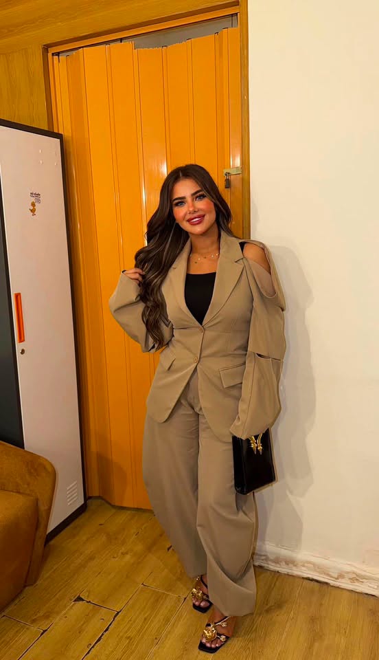 May be an image of suit