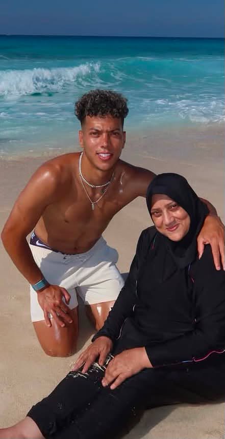 May be an image of one or more people, beach and ocean
