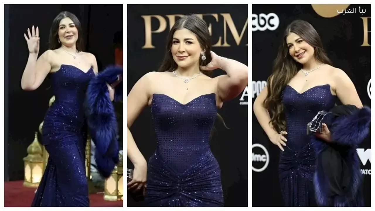 ملك قورة تتألق بفستان أزرق في حفل المتحدة